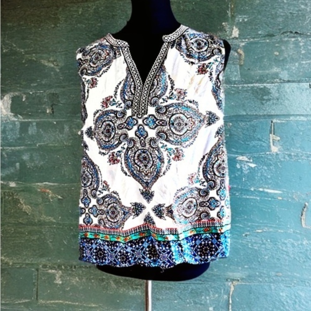 Large women's white sleeveless top with tribal print